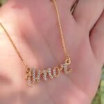 Colar Amor Cravejado com Zircônias banhado a ouro 18 k