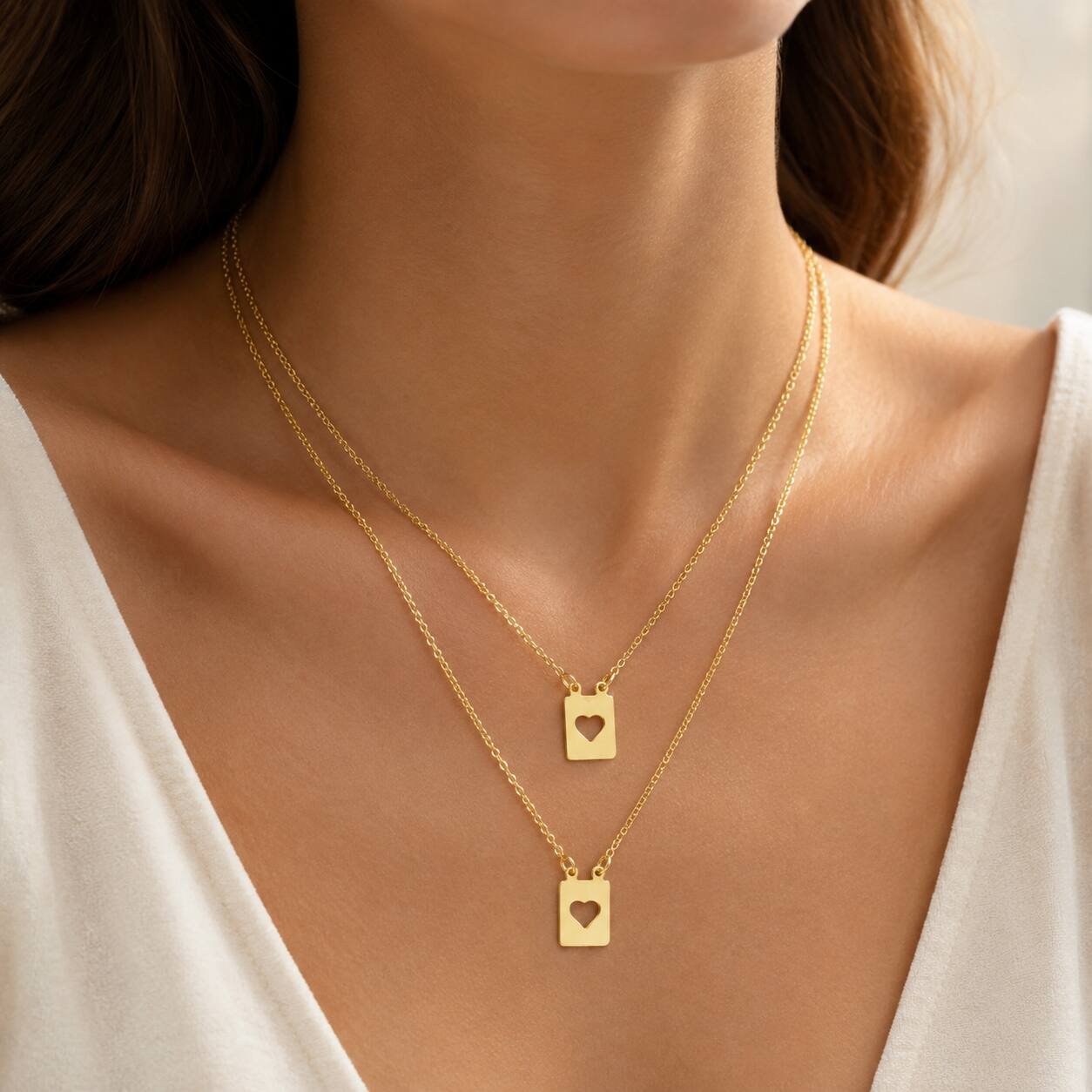 Colar Duplo Placas Corações Vazados banhado a ouro 18 k